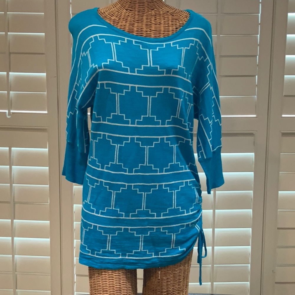 Elegant Blue Tunic Top with Flowing Design